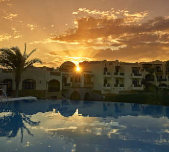 Dawar el omda boutique hotel pool and Exterior sunset view