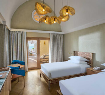 Sheraton presidential suite bedroom with twin beds and terrace