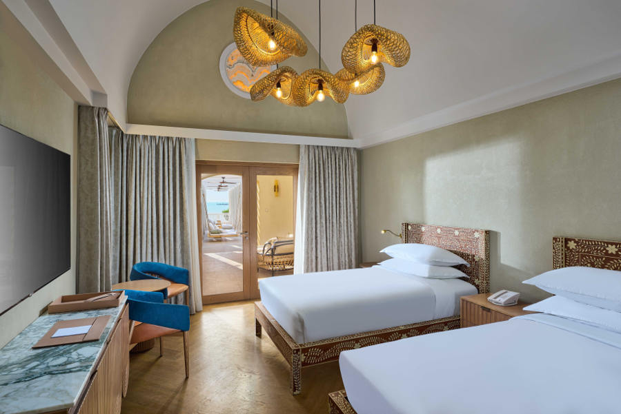 Sheraton presidential suite bedroom with twin beds and terrace