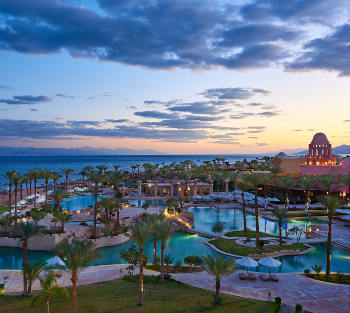 Sunset view on POOL and red sea from Taba Heights hotel in Egypt