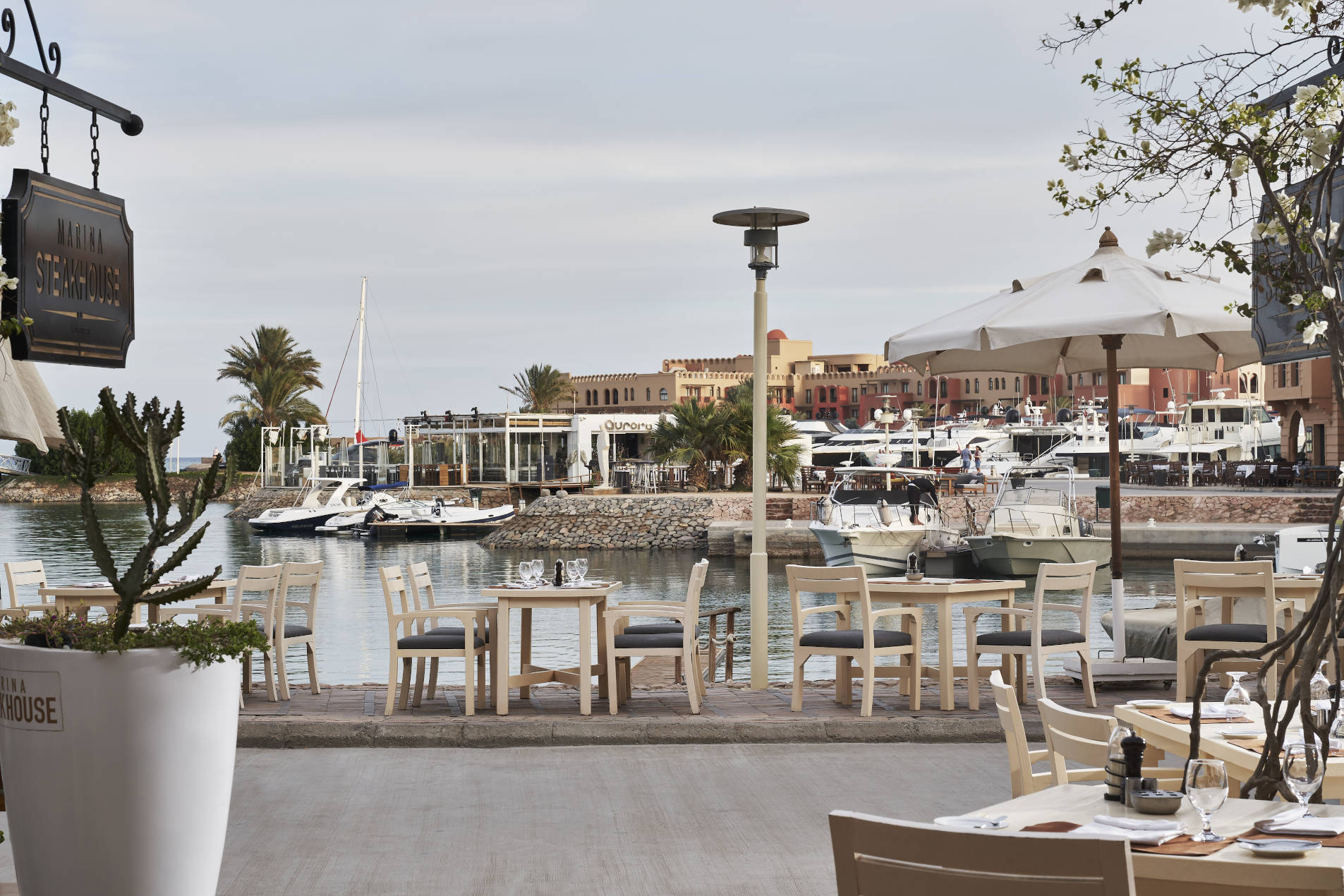 Outdoor Marina Sitting area of The Marina Steakhouse , the restaurant of Turtle's Inn and Captain's Inn Hotels