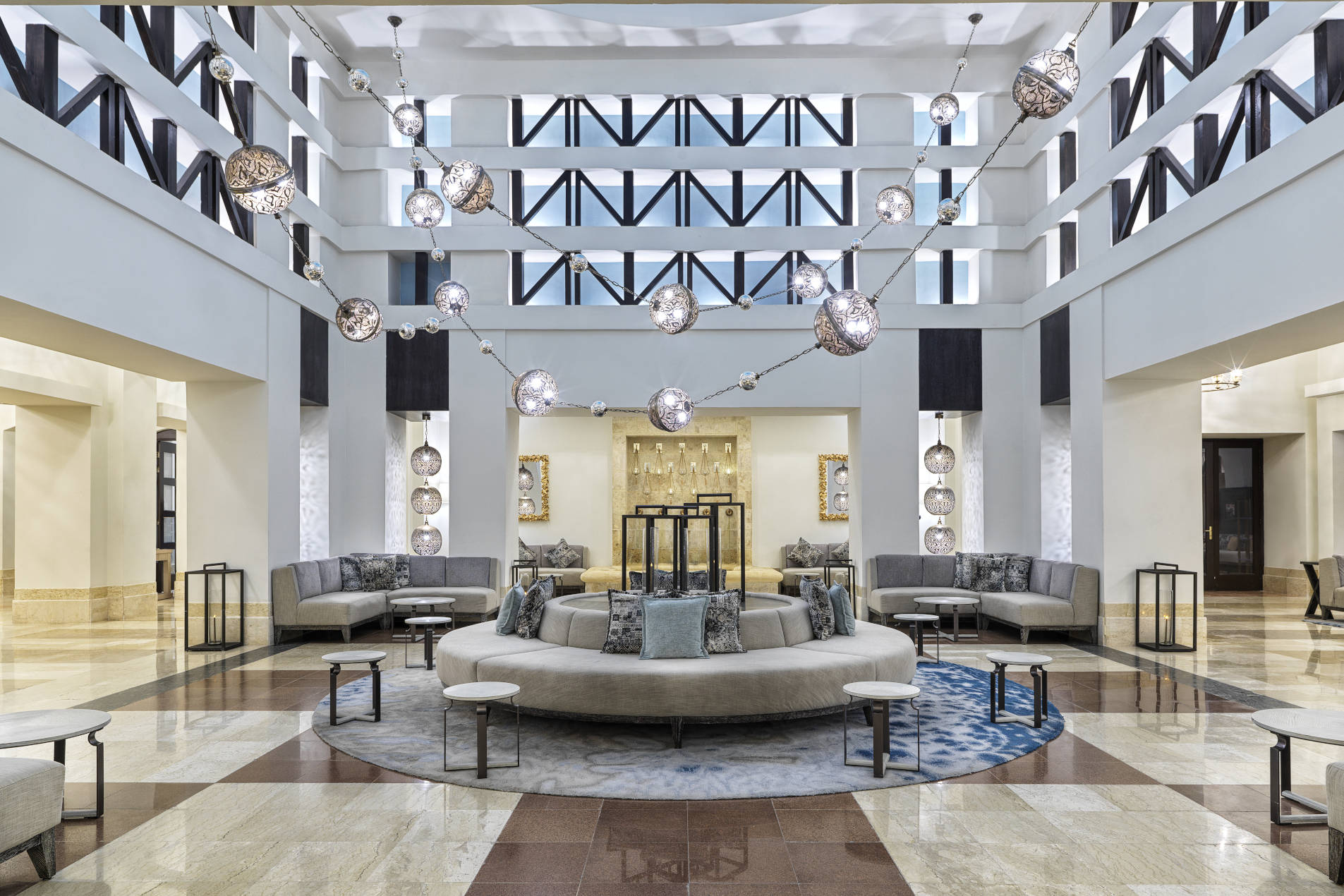 The lobby area with round sofa and authentic deocration of Sheraton Miramar El Gouna 5 stars hotel