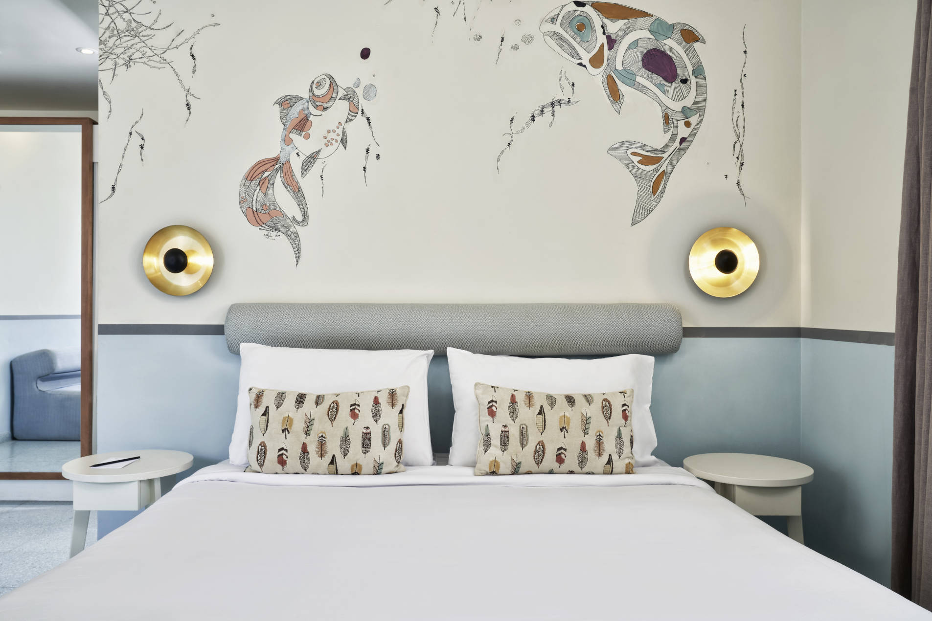 Water Theme Room in Turtle's Inn Hotel El Gouna Egypt with King size bed & two cushions with bohemian design feathers casing