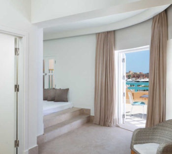 Captain's Inn Hotel Captain Suite with Modern floor bed & big terrace on the Abu Tig Marina El Gouna with seating table