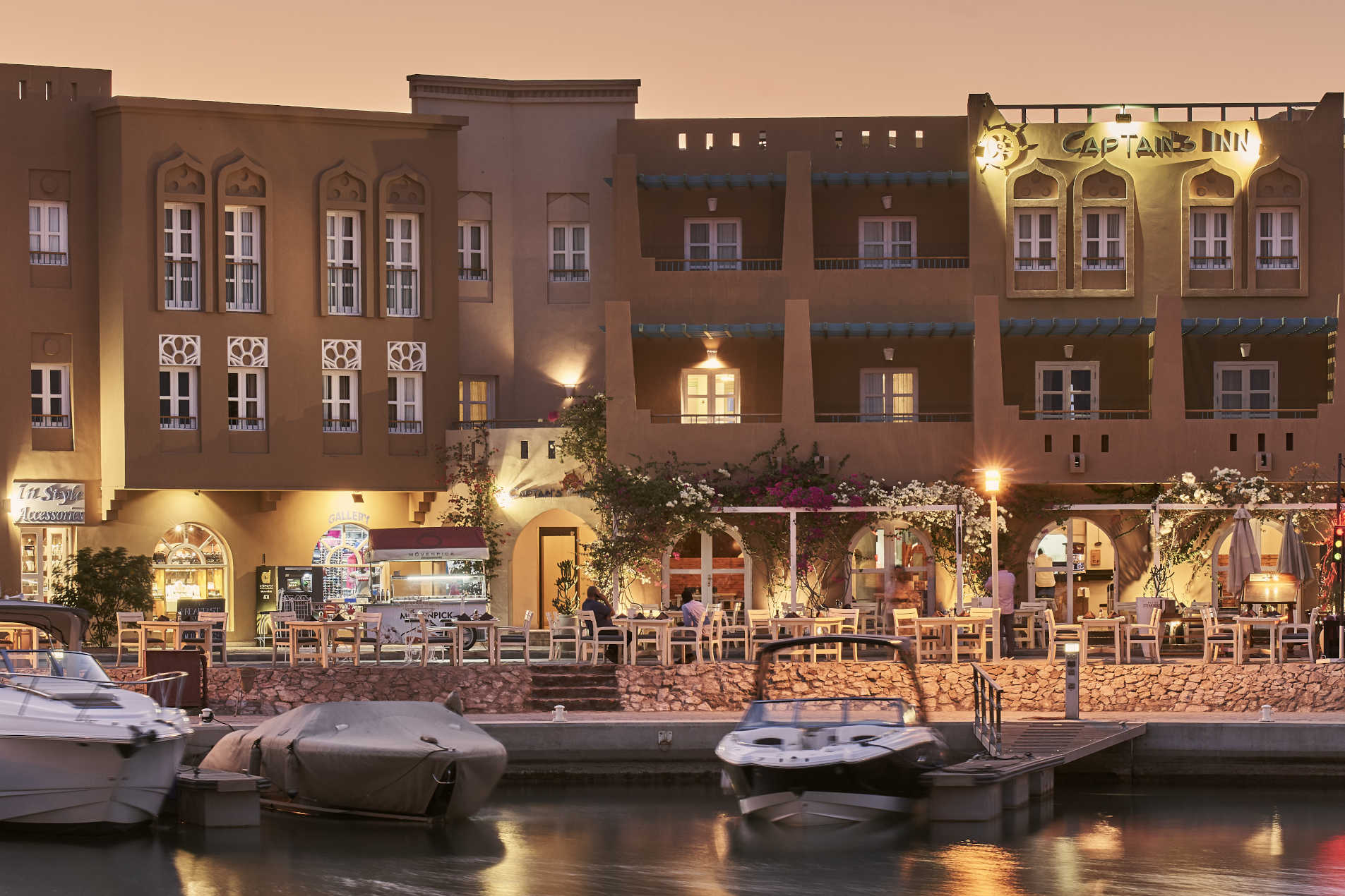 Night time exterior view of Captains in Hotel El Gouna from the marina side showing Hotel entrance & Marina steakhouse
