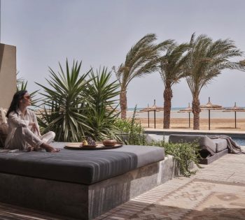 junior suite with shared pool and seating area at casa cook el gouna hotel