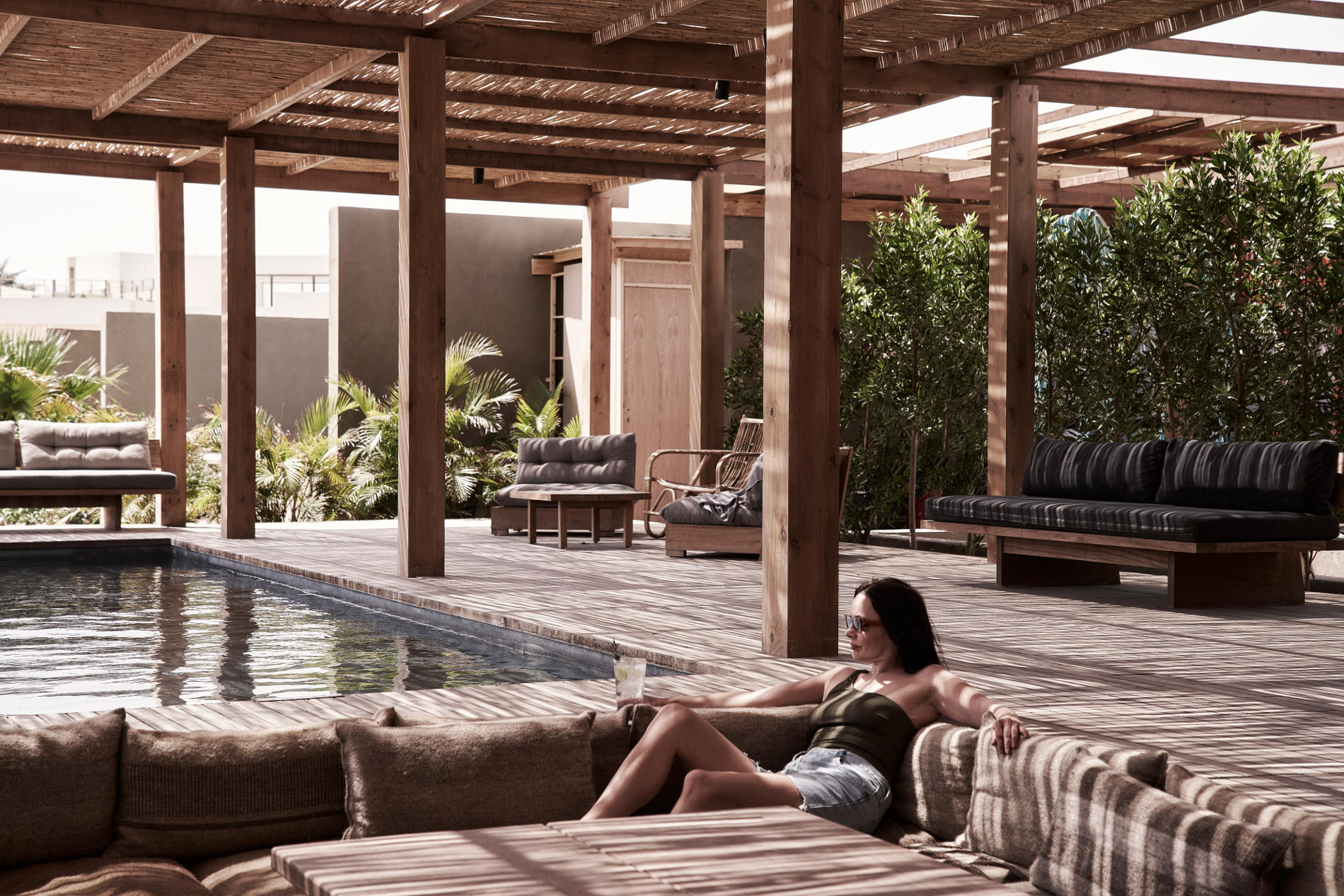 kitestation pool - lady relaxing after kiting at Casa Cook el Gouna Egypt