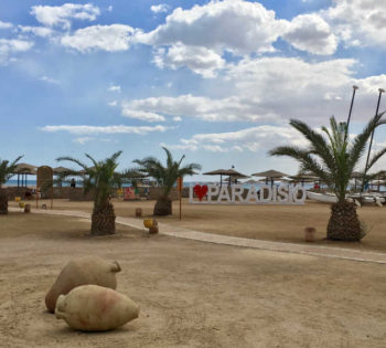 The sandy beach of Club Paradisio Hotel with beach bar that offers a wide range of drinks in El Gouna Hotels