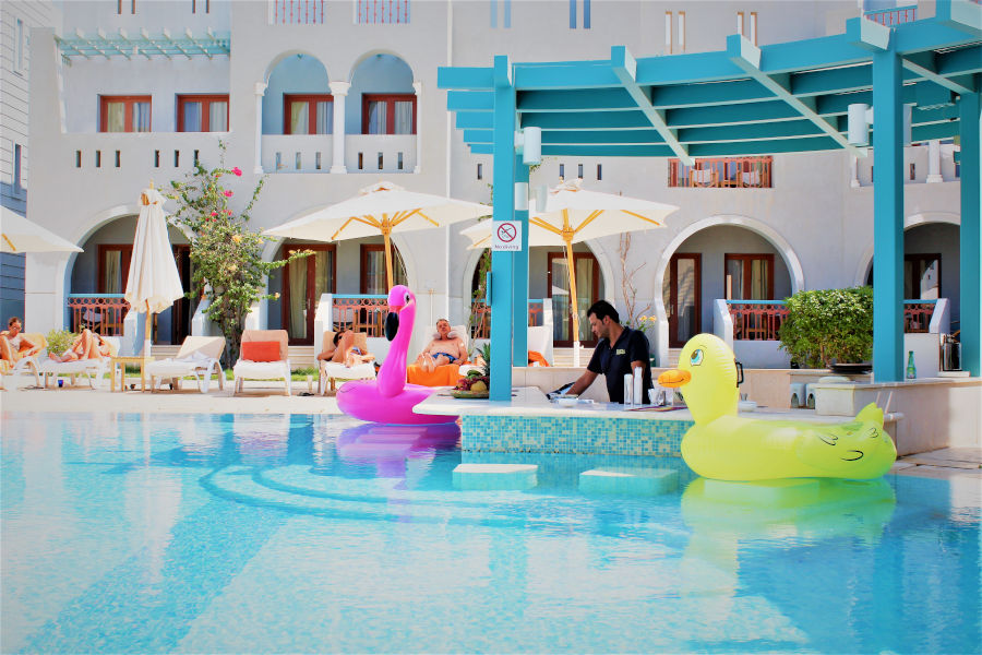 Kiki's Pool Bar relaxation spot offers snacks and drinks in and around the pool area