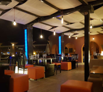 Duport pool club restaurant Abu Tig Marina El Gouna serves drinks and dinner