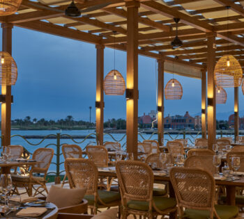 lanterns over the dinner tables at the min restaurant at steigenberger