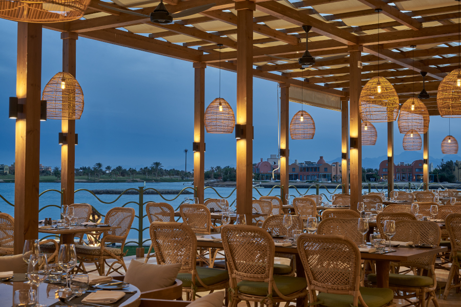 lanterns over the dinner tables at the min restaurant at steigenberger