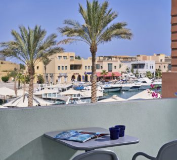 Daytime Abu Tig Marina View from Turtle's Inn Marina View Room, View includes beautiful Blue Redsea water, yachts & pier 88