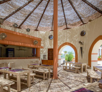 Restaurant outdoor sitting area of Zeytouna beach for Dawar El Omda Hotel Guests, Beach is 350 m long & has heated pools