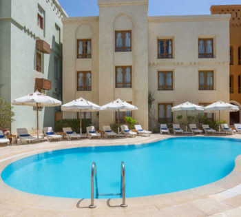 Ali Pasha pool with sunbeds that is available to guests of Turtle's Inn and Captain's Inn Hotels in El Gouna Abu Tig Marina