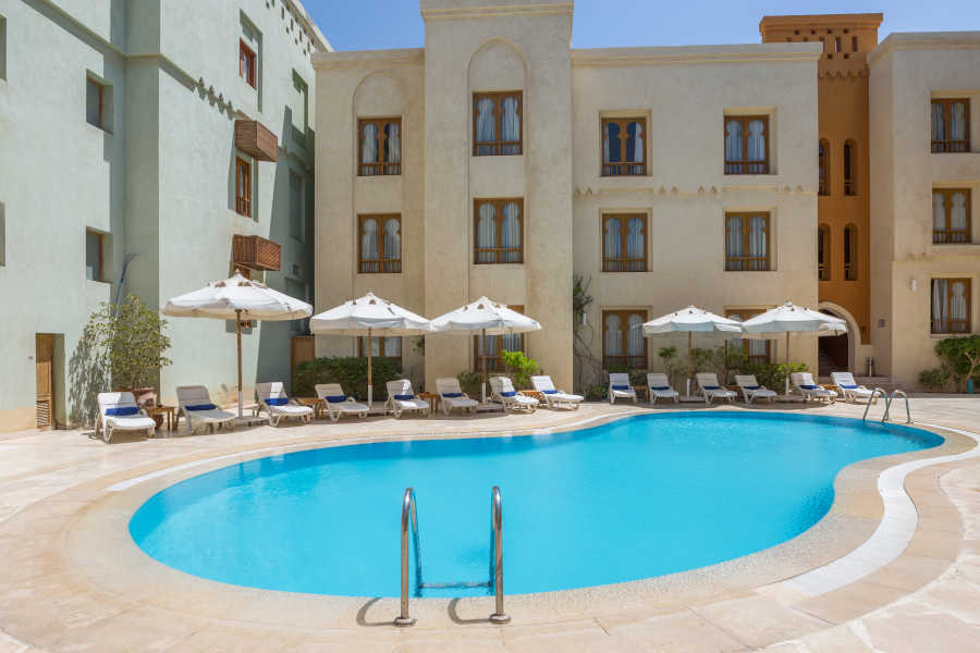 Ali Pasha pool with sunbeds that is available to guests of Turtle's Inn and Captain's Inn Hotels in El Gouna Abu Tig Marina