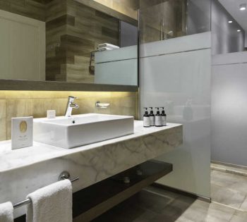 The marbled beige bathroom with a shower cabinet at Ancient Sands Golf Resort and Residences in El Gouna Egypt