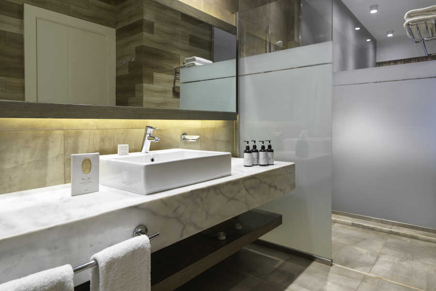 The marbled beige bathroom with a shower cabinet at Ancient Sands Golf Resort and Residences in El Gouna Egypt