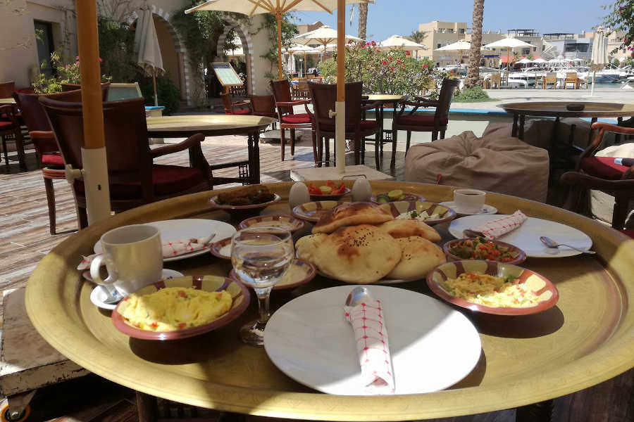 A breakfast meal presented on a table of Abu Tig Marina El Gouna Restaurant, At Sokrat's El Gouna Redsea Egypt