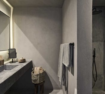 Standard room bathroom with a shower on the right and a sink on the left with wide mirror and a makeup mirror at Casa Cook El Gouna Resort