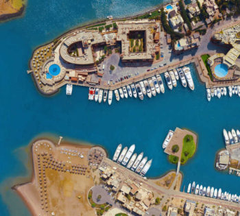 A bird eye overview for Abu Tig Marina in El Gouna showing the luxurious yachts, hotels, restaurants and bars