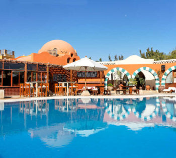 A daylight overview for the Club House Pool that overlooking El Gouna Red Sea lagoons and near to Dawar El Omda and Sultan Bey Hotels