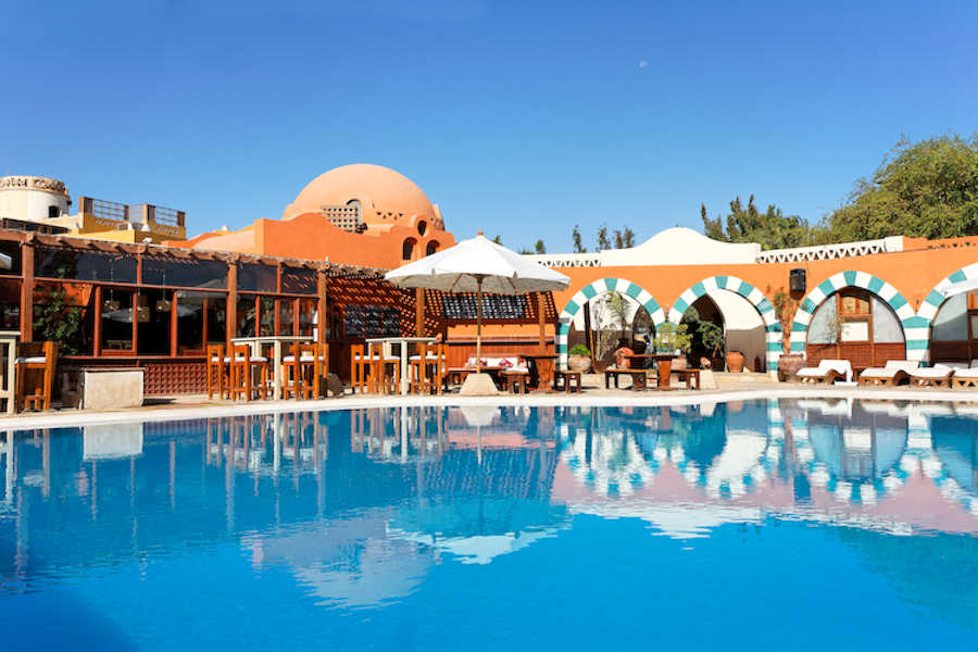 A daylight overview for the Club House Pool that overlooking El Gouna Red Sea lagoons and near to Dawar El Omda and Sultan Bey Hotels