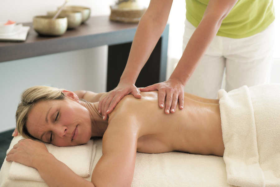 A lady is chilling out for a massage in Finger's Secret Spa in front of Dawar El Omda Hotel in El Gouna