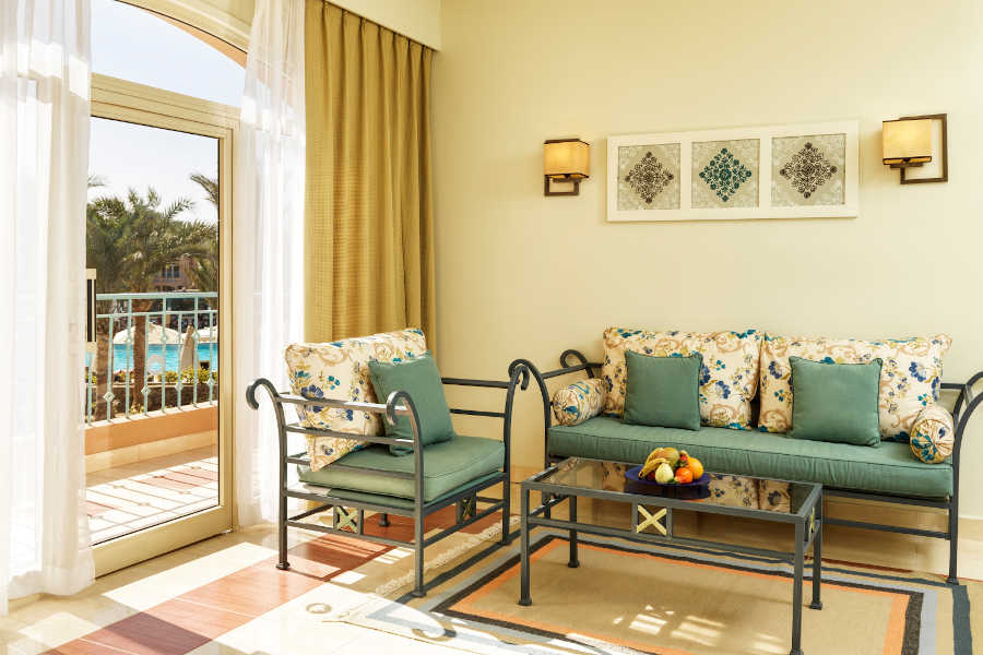 Suite sitting area of Labranda Club Paradisio four stars hotel in El Gouna overlooking the swimming pool
