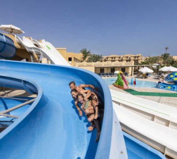 A family having fun time in Aqua Splash Park in Rihana Resort and Rihana Inn in El Gouna Egypt