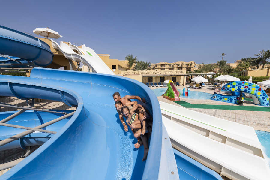 A family having fun time in Aqua Splash Park in Rihana Resort and Rihana Inn in El Gouna Egypt