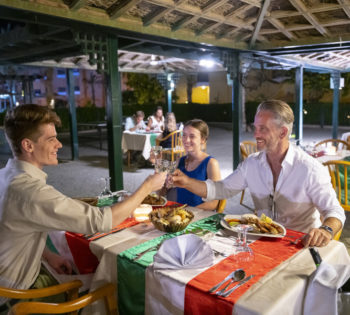 three people enjoying their dinner at dolce vita restaurant at Rihana resort in el gouna