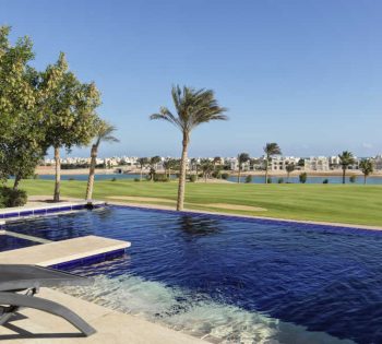 The private swimming pool of the golf villa at Ancient Sands Golf Resort in El gouna that overlooking golf spaces and Red Sea lagoons