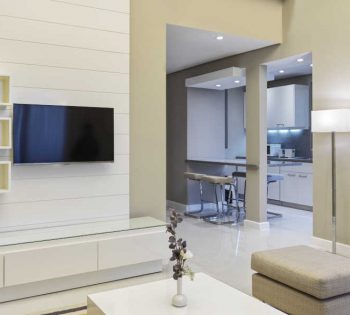 The living area at Golf Villa in Ancient Sands Residences in El Gouna with LCD screen and connected to the kitchen