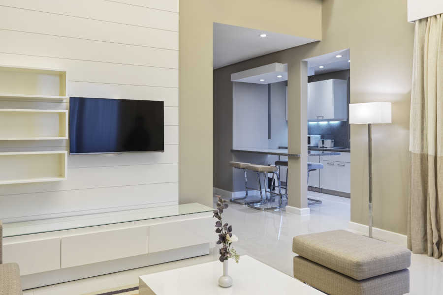 The living area at Golf Villa in Ancient Sands Residences in El Gouna with LCD screen and connected to the kitchen