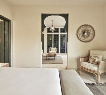 Living area view from the bed room of Ali Pasha Hotel El Gouna showing modern furniture arabesque style decorations & carpets