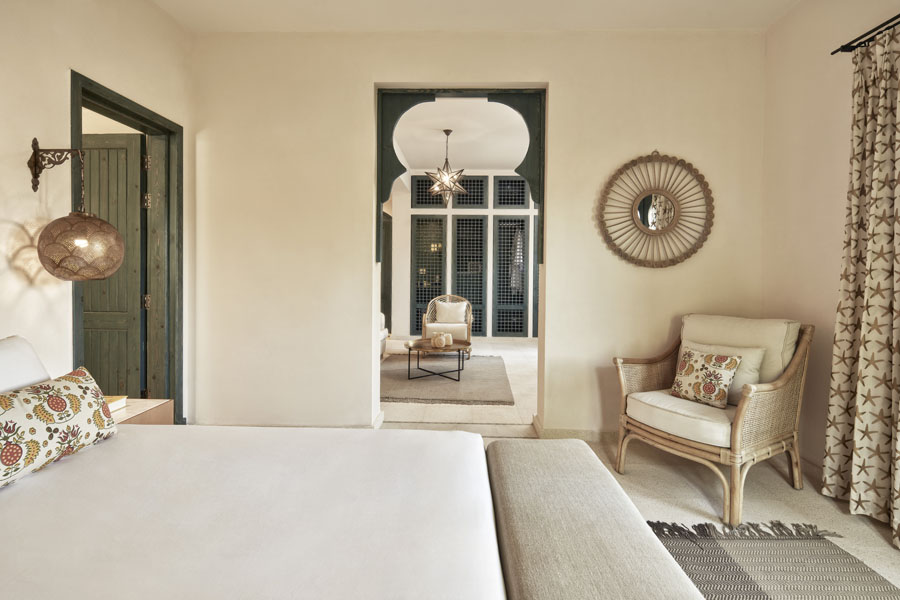 Living area view from the bed room of Ali Pasha Hotel El Gouna showing modern furniture arabesque style decorations & carpets