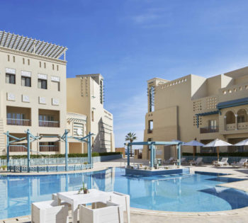 adult swimming pool and bar at mosaqiue hotel el gouna