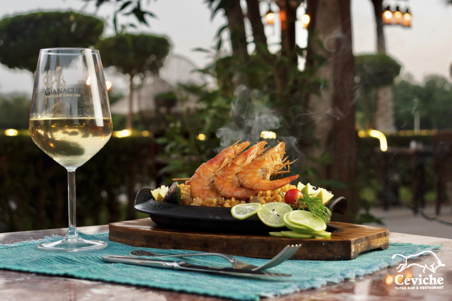 tapas and a glass of wine at ceviche el gouna