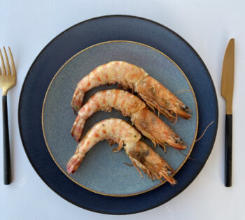 three shrimps on a plate