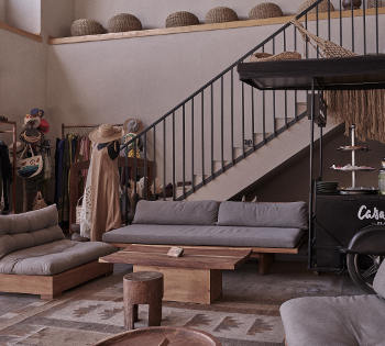 casa cook boho style store with sofa, coffee corner, hats and summer dresses