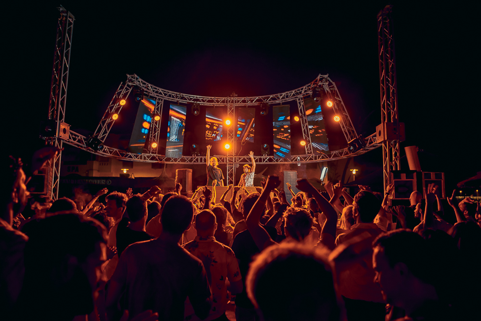 Dj and Crowd during a Party.