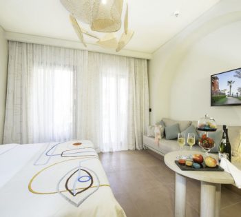Superior Room Bed and TV in Three Corners Ocean View Hotel-ElGouna