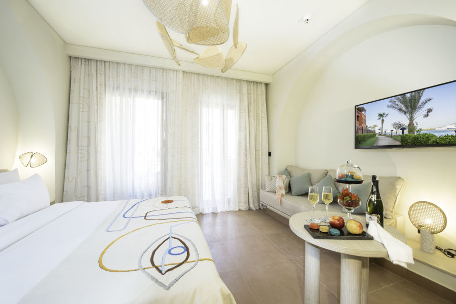 Superior Room Bed and TV in Three Corners Ocean View Hotel-ElGouna