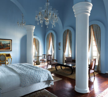 king bed inside Beach front suite at la maison bleue el gouna hotel