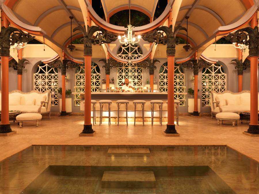 pool bar area inside la maison bleue luxury hotel el gouna during the night