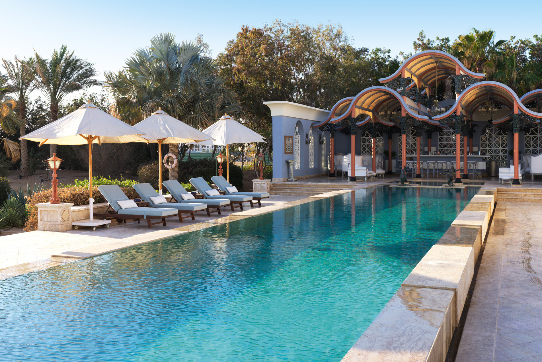 pool and seating area inside la maison bleue el gouna luxury hotel