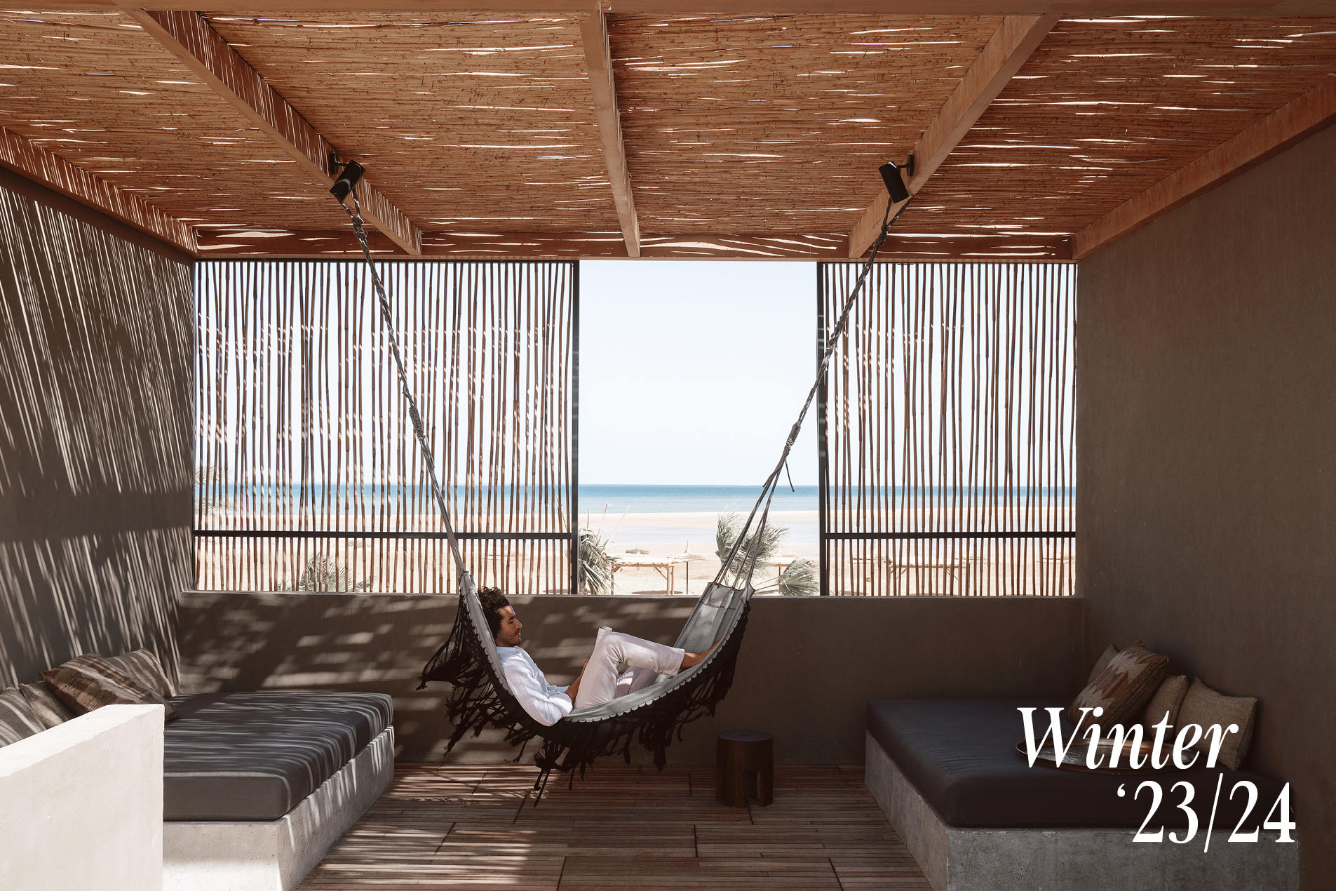 men relaxing in hamock with the view over El Gouna beach at the red sea. Winter 23/24 offers